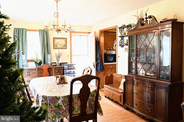 4092 Manchester St, Glen Rock, PA 17327 - dining space featuring a chandelier and light wood-style flooring