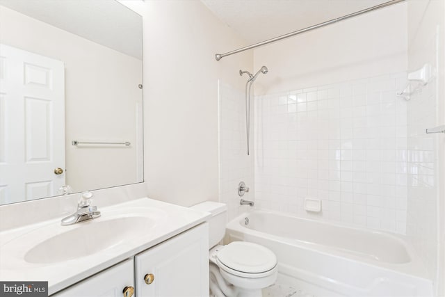 bathroom featuring toilet, bathtub / shower combination, and vanity