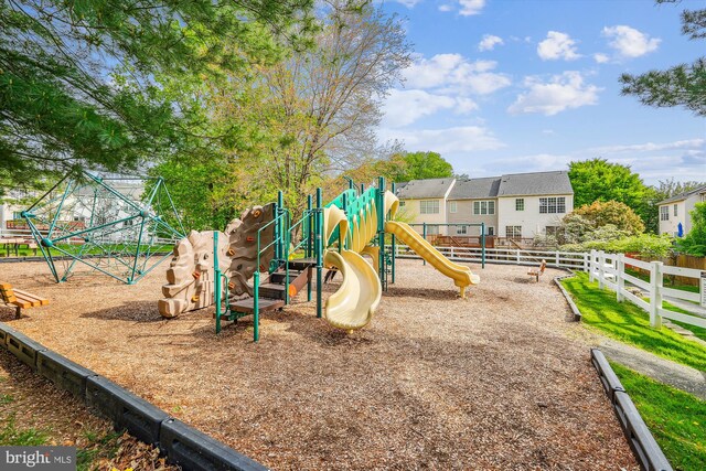 community play area featuring fence