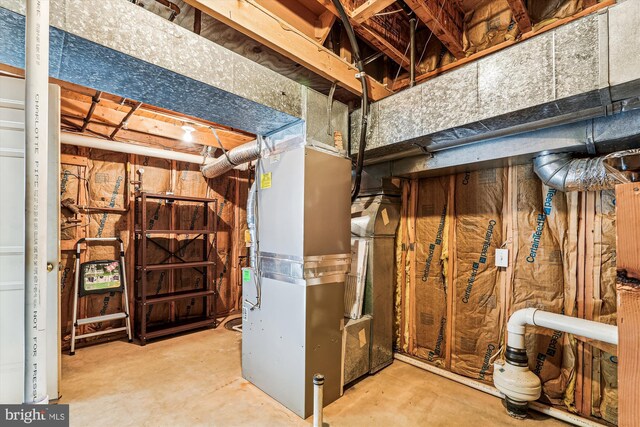 unfinished basement with heating unit