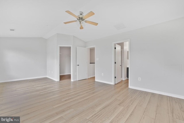 159 Heathfield Dr, Frederick, MD 21702 - unfurnished bedroom featuring vaulted ceiling, light wood finished floors, baseboards, a spacious closet, and a closet