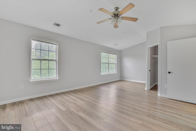 159 Heathfield Dr, Frederick, MD 21702 - empty room with vaulted ceiling, light wood finished floors, ceiling fan, and baseboards