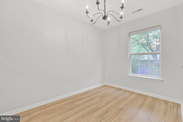 159 Heathfield Dr, Frederick, MD 21702 - unfurnished room featuring light wood-style floors, a chandelier, and baseboards