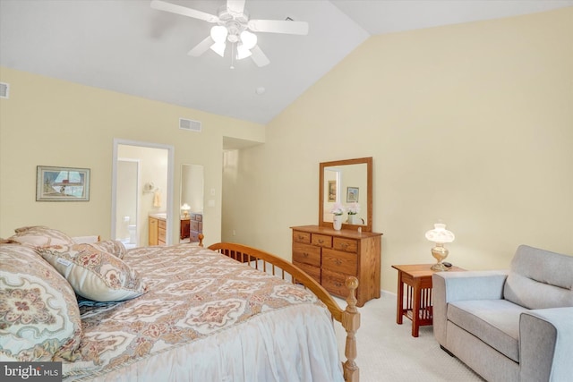 bedroom with connected bathroom, high vaulted ceiling, visible vents, and light carpet