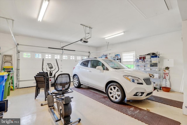 garage featuring a garage door opener