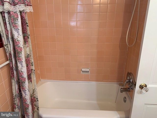 full bathroom featuring shower / bathtub combination with curtain