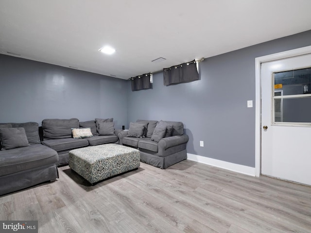 331 Possum Ct, Capitol Heights, MD 20743 - living area featuring baseboards and wood finished floors