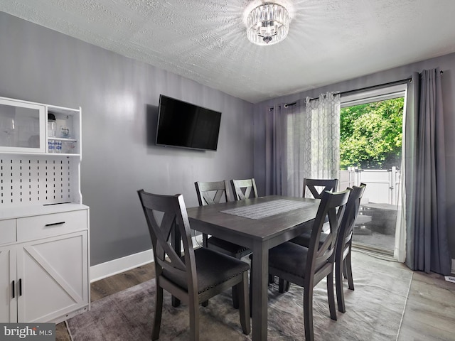 331 Possum Ct, Capitol Heights, MD 20743 - dining area with a textured ceiling and light wood-style flooring