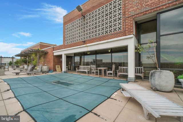 1301 20th St NW Unit 415, Washington, DC 20036 - view of swimming pool featuring a covered pool and a patio area
