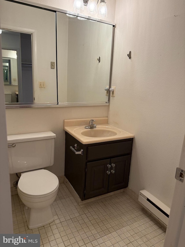 492 Delair Rd Unit C, Monroe, NJ 08831 - bathroom with a baseboard radiator, tile patterned flooring, vanity, and toilet