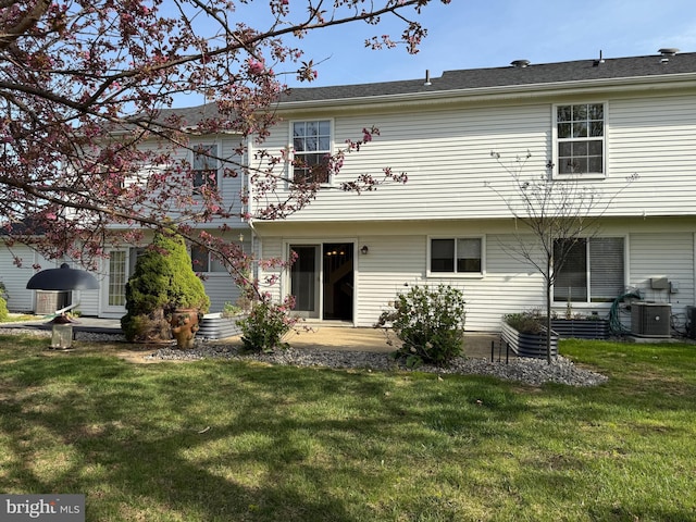 492 Delair Rd Unit C, Monroe, NJ 08831 - back of house featuring a lawn and central AC unit