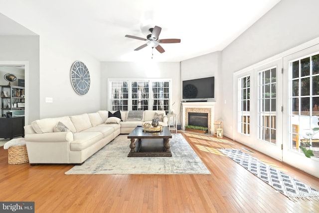 14401 Broadwinged Dr, Gainesville, VA 20155 - living room featuring hardwood / wood-style floors, ceiling fan, and a glass covered fireplace