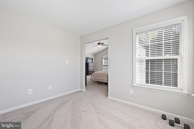 14401 Broadwinged Dr, Gainesville, VA 20155 - spare room with carpet flooring, baseboards, a ceiling fan, and vaulted ceiling