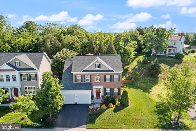 14401 Broadwinged Dr, Gainesville, VA 20155 - view of front of home with driveway and a front yard