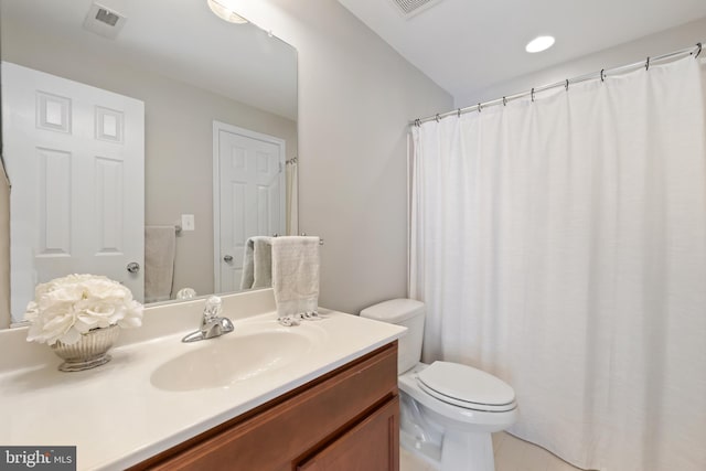 14401 Broadwinged Dr, Gainesville, VA 20155 - bathroom with toilet, vanity, and tile patterned floors