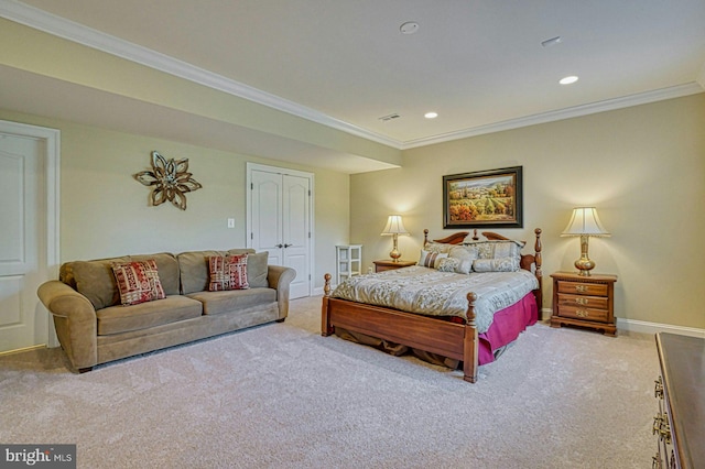 bedroom with baseboards, carpet floors, and crown molding