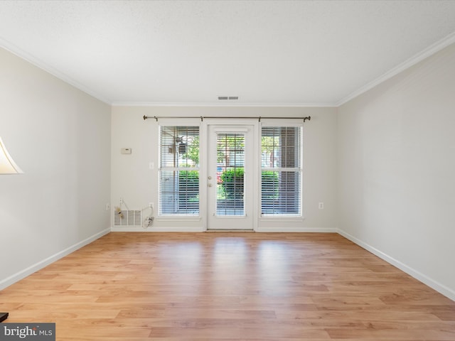21019 Timber Ridge Ter Unit 102, Ashburn, VA 20147 - empty room with light wood finished floors, ornamental molding, and baseboards