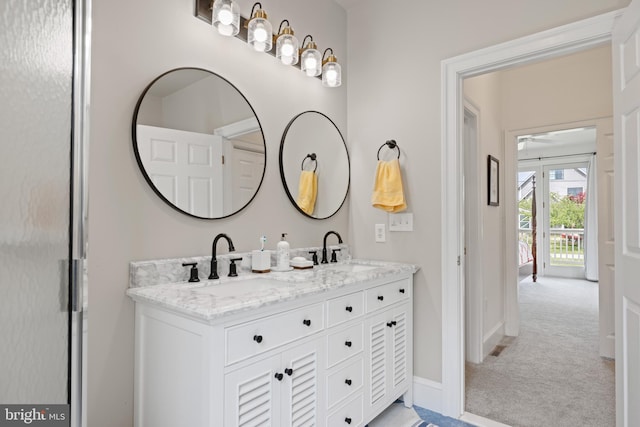 9050 Point Ln, Chestertown, MD 21620 - full bathroom featuring a sink, baseboards, a ceiling fan, and double vanity