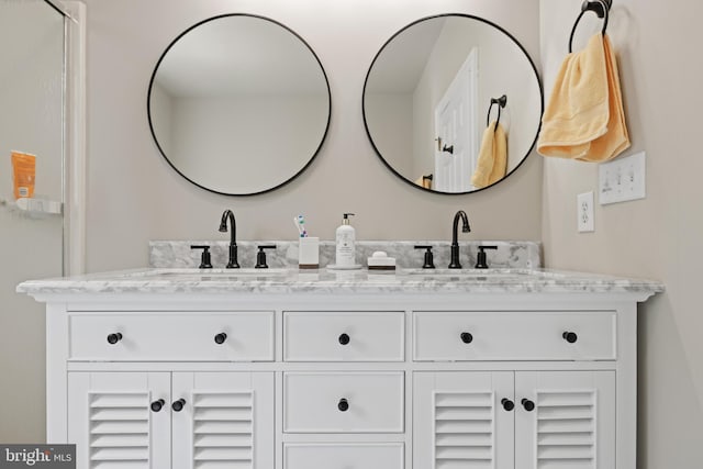 9050 Point Ln, Chestertown, MD 21620 - bathroom featuring double vanity and a sink