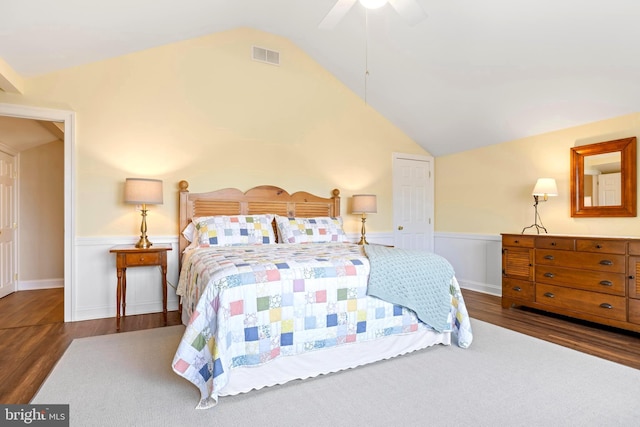 9050 Point Ln, Chestertown, MD 21620 - bedroom featuring vaulted ceiling, wainscoting, wood finished floors, and visible vents