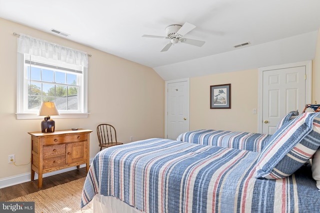 9050 Point Ln, Chestertown, MD 21620 - bedroom with baseboards, visible vents, wood finished floors, and lofted ceiling