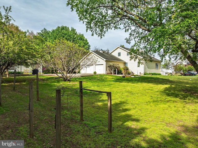 9050 Point Ln, Chestertown, MD 21620 - view of yard featuring a garage and driveway