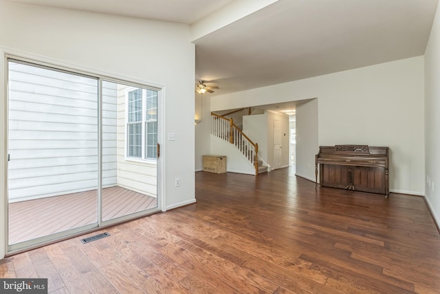 46878 Graham Cv, Sterling, VA 20165 - interior space featuring visible vents, wood finished floors, a ceiling fan, and stairs