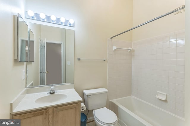 46878 Graham Cv, Sterling, VA 20165 - full bathroom featuring vanity, toilet, and bathtub / shower combination