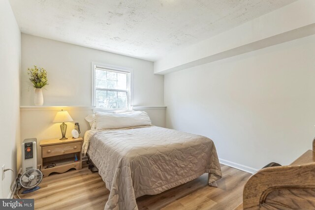 46878 Graham Cv, Sterling, VA 20165 - bedroom with wood finished floors