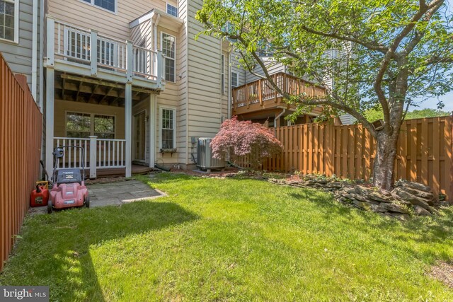 46878 Graham Cv, Sterling, VA 20165 - view of yard featuring central air condition unit, fence, and a balcony