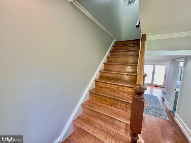 218 Stevenson Sq, Alexandria, VA 22304 - stairway featuring wood finished floors and baseboards