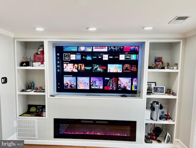 218 Stevenson Sq, Alexandria, VA 22304 - detailed view of ornamental molding, a glass covered fireplace, built in shelves, and recessed lighting