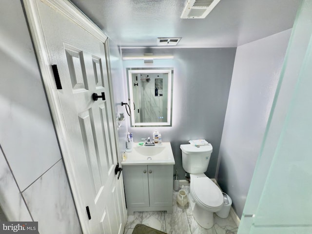 218 Stevenson Sq, Alexandria, VA 22304 - bathroom featuring vanity and marble look tiles