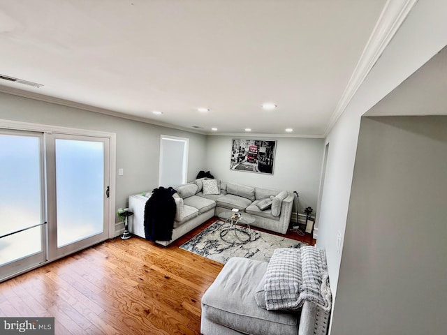 218 Stevenson Sq, Alexandria, VA 22304 - living room with recessed lighting, light wood finished floors, and crown molding