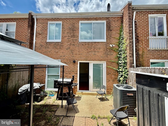 218 Stevenson Sq, Alexandria, VA 22304 - rear view of property with a gazebo, brick siding, and a patio area