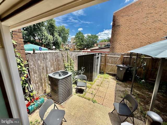 218 Stevenson Sq, Alexandria, VA 22304 - fenced backyard featuring a patio