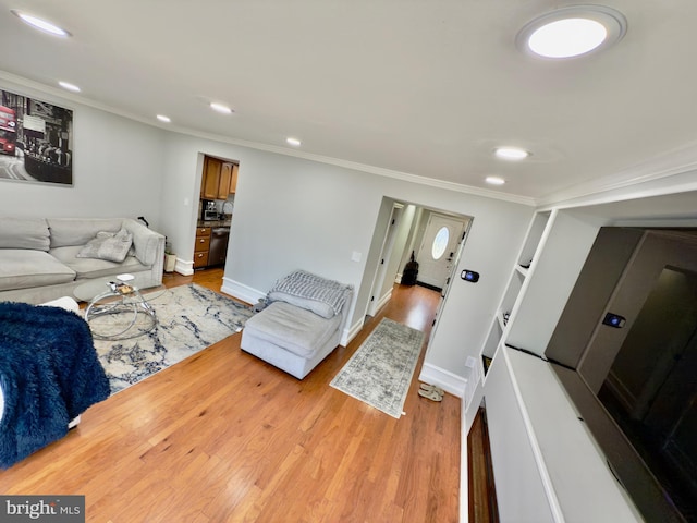 218 Stevenson Sq, Alexandria, VA 22304 - living area featuring recessed lighting, light wood-style flooring, and ornamental molding