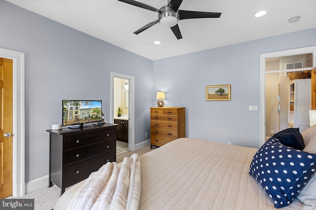 bedroom featuring light colored carpet, baseboards, and visible vents