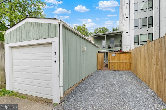 garage featuring fence