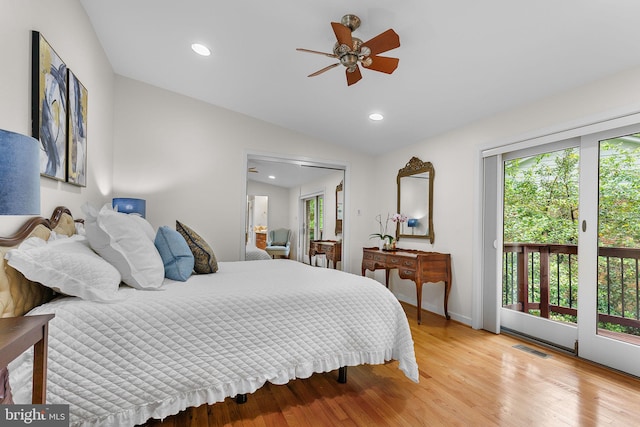 3440 Mansfield Rd, Falls Church, VA 22041 - bedroom with vaulted ceiling, access to outside, light wood-style floors, recessed lighting, and baseboards