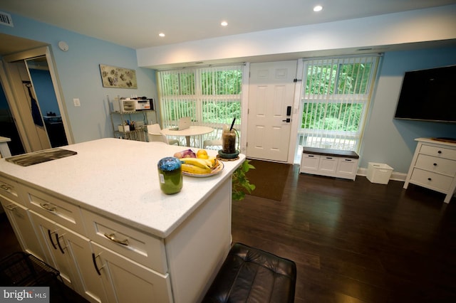 4225 Americana Dr Unit 4225A, Annandale, VA 22003 - kitchen with a kitchen island, dark wood-style flooring, recessed lighting, and plenty of natural light