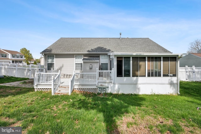 2 Underwood Ct, Burlington, NJ 08016 - view of front of house with a deck, a shingled roof, fence, a front lawn, and a sunroom