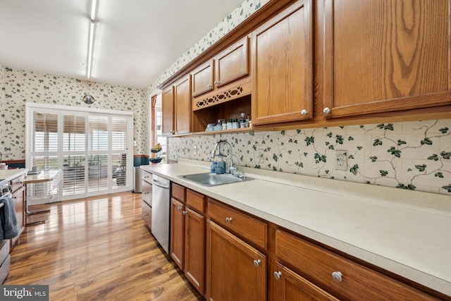 2 Underwood Ct, Burlington, NJ 08016 - kitchen with a sink, wallpapered walls, appliances with stainless steel finishes, and brown cabinetry
