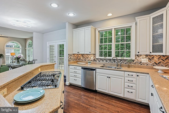 7098 Garden Walk, Columbia, MD 21044 - kitchen featuring stainless steel appliances, a sink, white cabinets, decorative backsplash, and recessed lighting