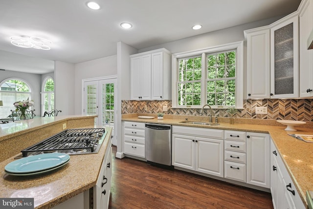 7098 Garden Walk, Columbia, MD 21044 - kitchen with appliances with stainless steel finishes, a sink, white cabinets, decorative backsplash, and recessed lighting
