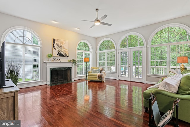 7098 Garden Walk, Columbia, MD 21044 - living room featuring a ceiling fan, hardwood / wood-style floors, and a fireplace with flush hearth