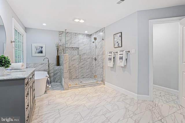 7098 Garden Walk, Columbia, MD 21044 - full bath with marble finish floors, a freestanding bath, a shower stall, baseboards, and vanity