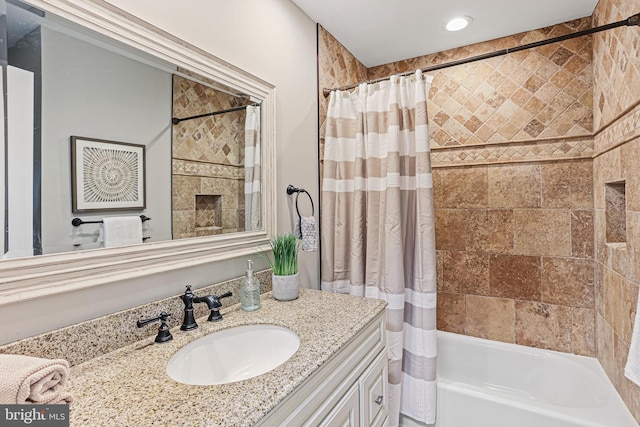 7098 Garden Walk, Columbia, MD 21044 - full bath with vanity, shower / bath combo with shower curtain, and a fireplace