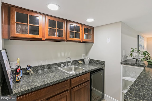 7098 Garden Walk, Columbia, MD 21044 - kitchen with a sink, dishwashing machine, glass insert cabinets, and light tile patterned floors
