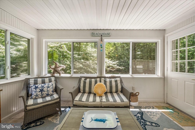 26 Capetown Rd, Ocean Pines, MD 21811 - sunroom / solarium featuring tile patterned floors, wood walls, and a healthy amount of sunlight